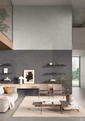 Modern living room with gray walls, wooden furniture, and decorative elements.