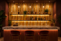 Modern bar with wooden shelves, bottles, and a counter with chairs.