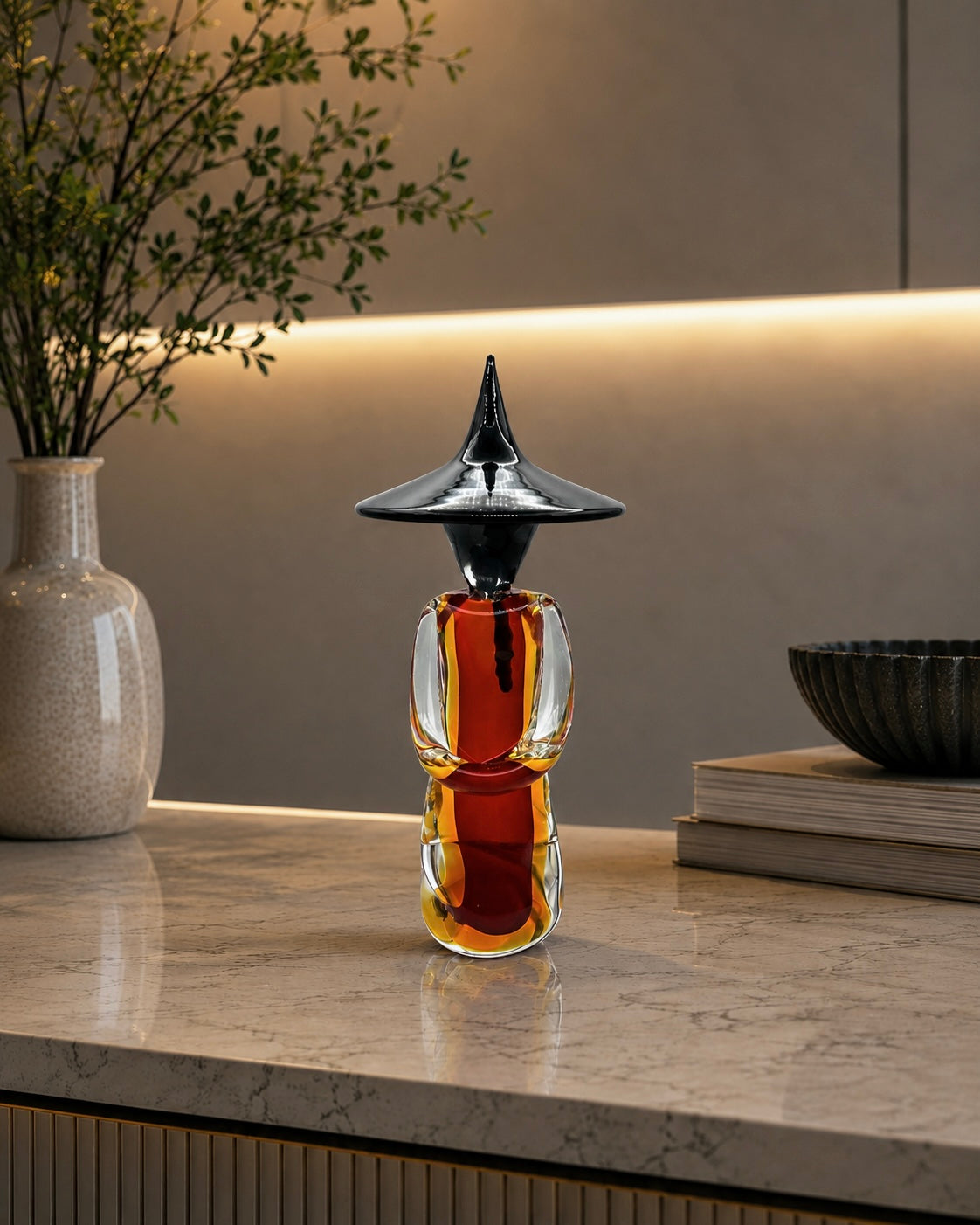 Decorative bottle with a unique design on a marble surface with a neutral background