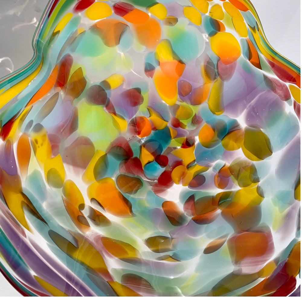 Colorful glass sculpture with swirl patterns