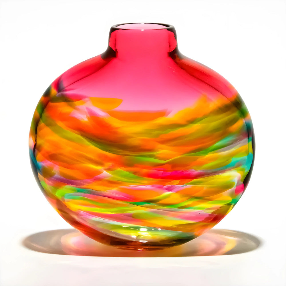 Colorful glass vase with swirl pattern on a white background