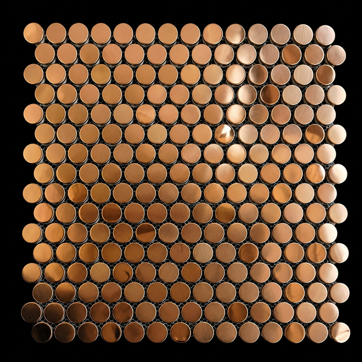 Close-up of a copper penny mosaic on a black background