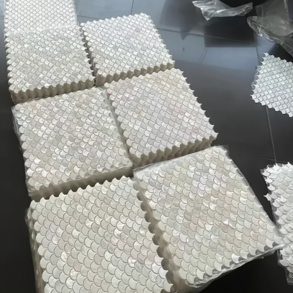 White hexagonal tiles on a black surface