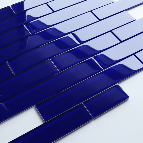 Blue ceramic tiles arranged in a brick pattern on a white background